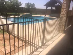 Decorative fence and custom gate installation for homes and businesses in Lubbock and Dallas–Fort Worth TX
