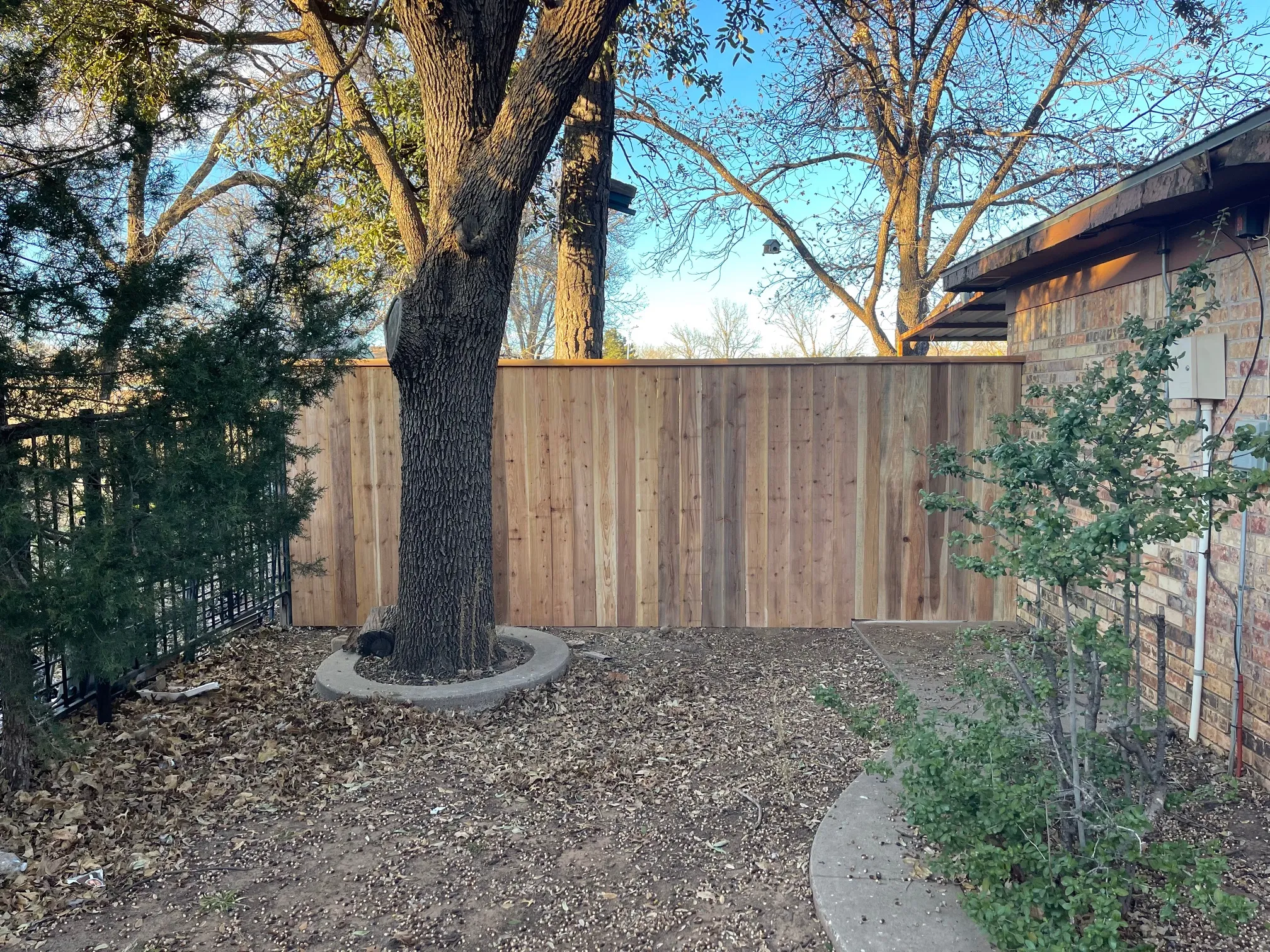 Tight board-to-board cedar pickets for maximum privacy coverage