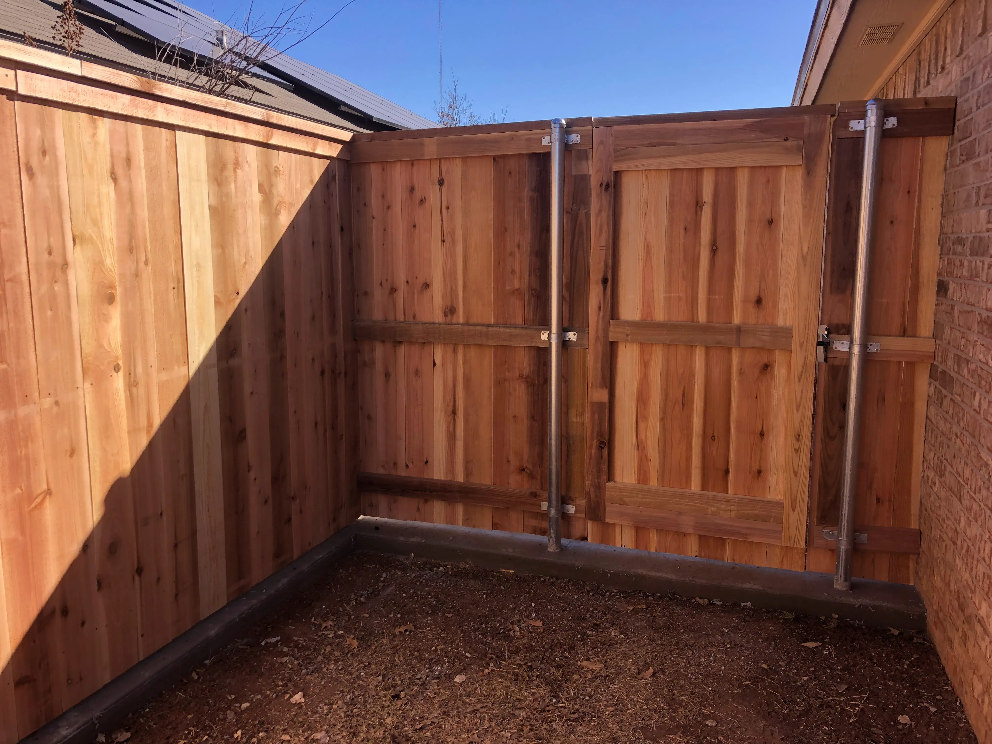 Custom 5-foot steel-frame cedar privacy gate with reinforced hinges