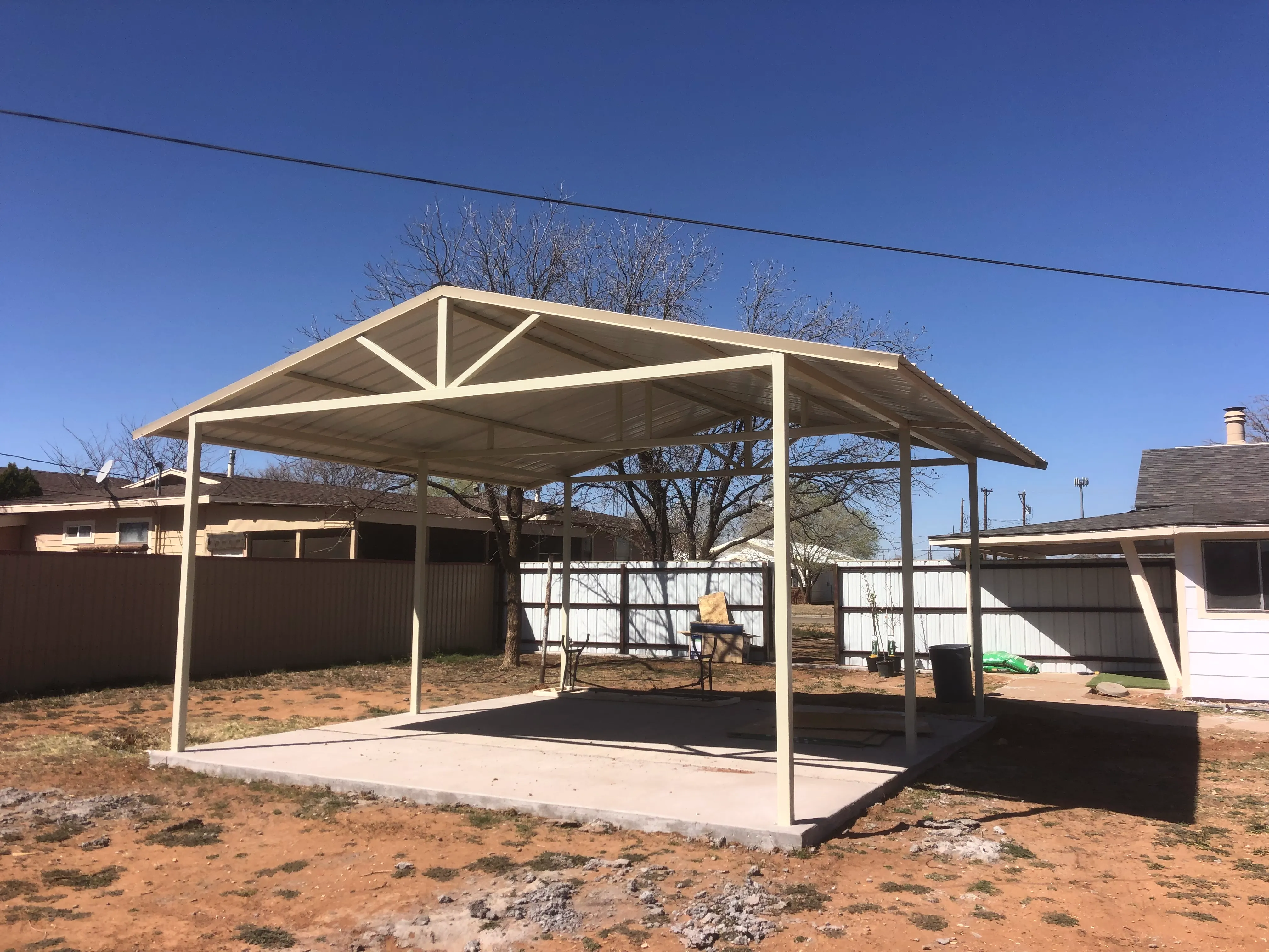 15 by 15 foot concrete pergola built for outdoor seating area in Lubbock Texas