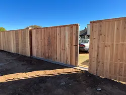 Custom steel automatic driveway gate and sliding gate installation for residential and ranch properties in DFW and West Texas